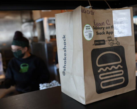 Shake Shack swings to quarterly loss, names new CFO; shares fall 20%
