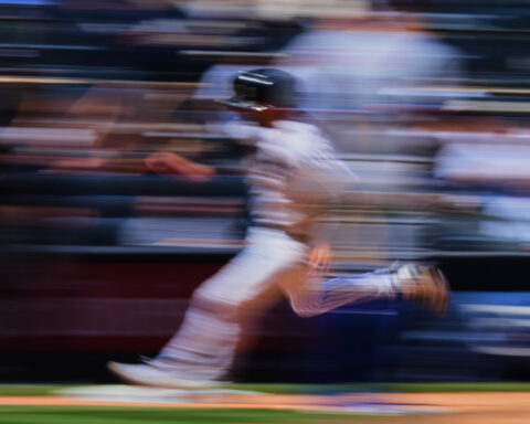 Grisham leads Yankees over Rangers 9-2 for 16th win in 19 games but Domínguez hurt hitting wall