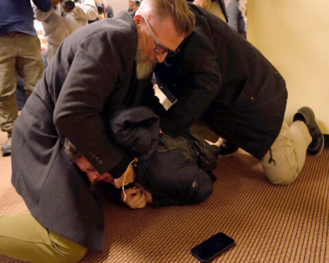 Man who sprayed vinegar at Rep. Ilhan Omar during town hall pleads guilty to assault