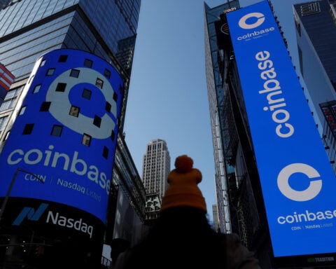 Coinbase logs second straight quarterly loss as crypto trading momentum fades