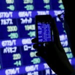 Oil jumps and stock futures slip on renewed US-Iran fighting