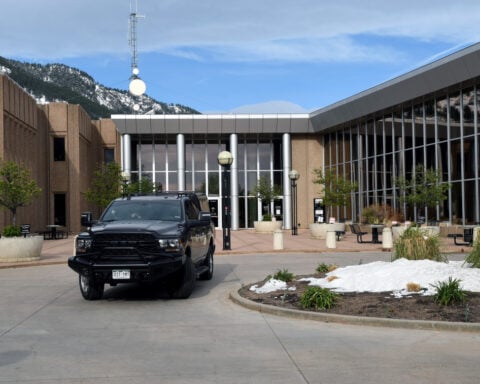 Man who firebombed a demonstration in Colorado, killing 1, is sentenced to life in prison