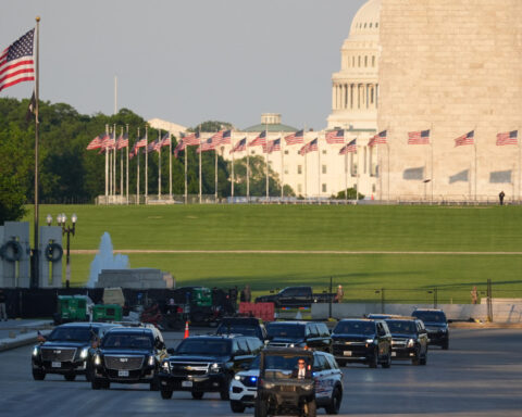 Trump drives across Lincoln Memorial Reflecting Pool to inspect new blue coating he's putting on it