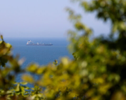 Hungry to sell, UAE slips hidden oil tankers through Strait of Hormuz