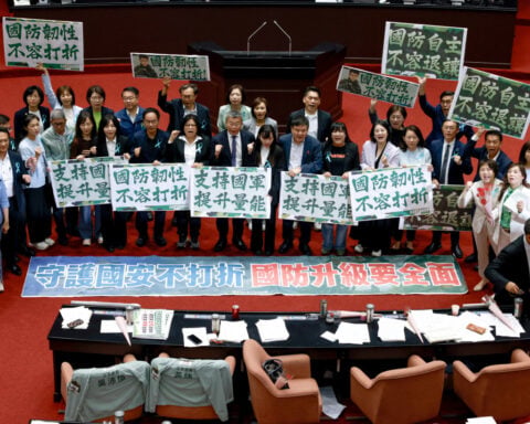 Taiwan parliament approves extra defence spending but less than government wanted