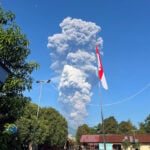 At least three dead and dozens trapped after volcano erupts in Indonesia