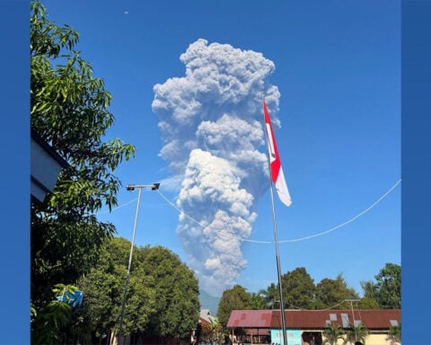 At least three dead and dozens trapped after volcano erupts in Indonesia