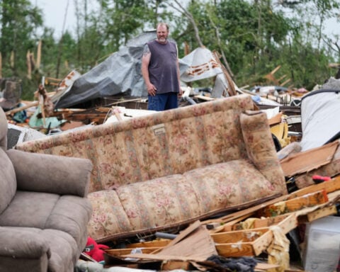 A faint meow in the rubble of a Mississippi tornado leads to a stunning rescue