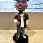 Orioles hold Tupac Skakur bobblehead promotion, and his sister throws out the ceremonial first pitch