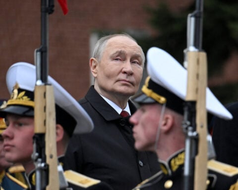 Putin attends scaled-back WW2 victory parade as worries deepen over Ukraine war