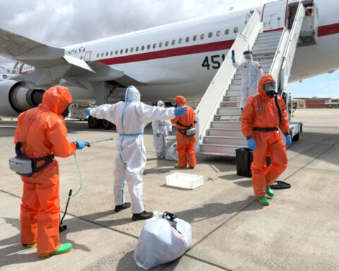 One evacuated passenger tests positive for hantavirus and another develops symptoms on flight home