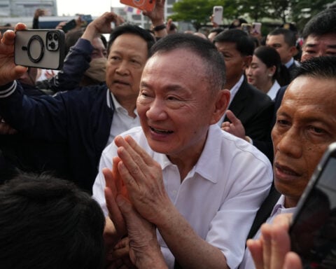 Thailand's Thaksin released from prison after serving 8 months for abuse of power