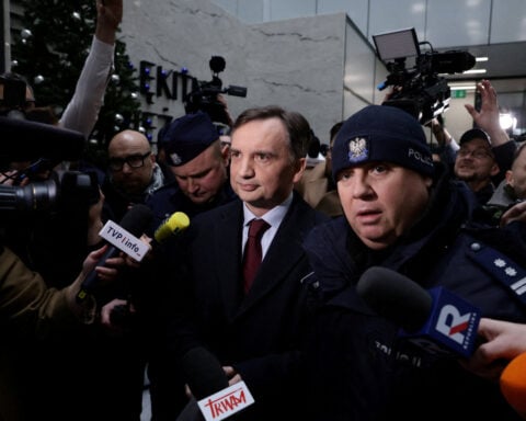 Poland says it wants answers after fugitive ex-minister leaves Hungary for US