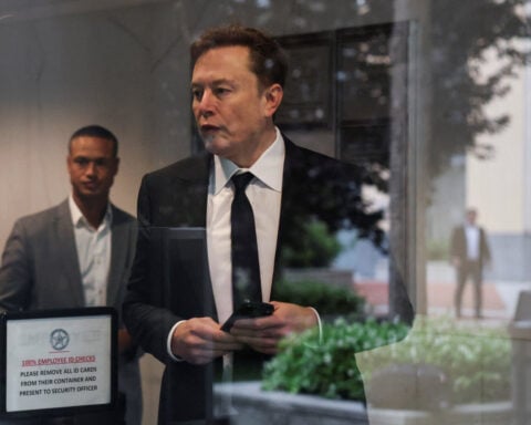 Elon Musk, Apple's Cook and Boeing CEO going to China with Trump, official says