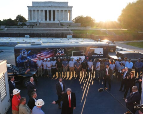A nonprofit sues to halt Trump’s 'American flag blue' repaint of the Reflecting Pool