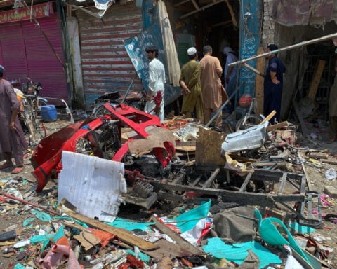 Bomb rigged to rickshaw explodes in Pakistan bazaar, killing 9 and wounding more than 2 dozen others