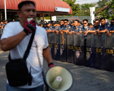 Philippine senator vows to fight International Criminal Court order to arrest him over killings