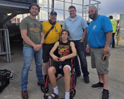 Teen athlete performs with band after season-ending injury