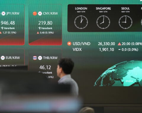 Asian shares trade mixed as AI excitement fades and war worries continue