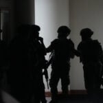 Gunfire breaks out in Philippine Senate where authorities have tried to arrest a senator