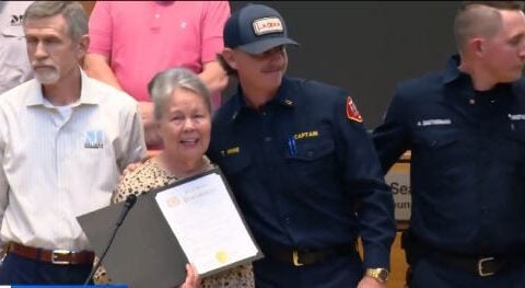 Firefighters honored for going beyond, comforting and aiding resident in her husband's final days