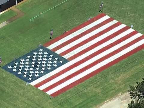 Family paints American flag in yard to celebrate 250 years of independence