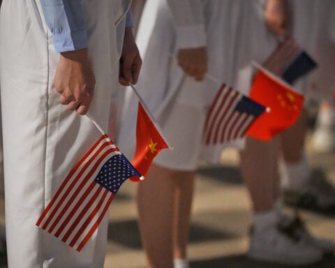 The Latest: Presidents Xi and Trump kick off their high-profile summit in Beijing