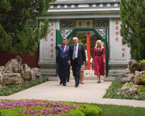 The Latest: After China visit, Trump says he’s undecided on sending weapons to Taiwan