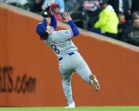 Rangers say second baseman Josh Smith will be hospitalized at least a week with viral meningitis