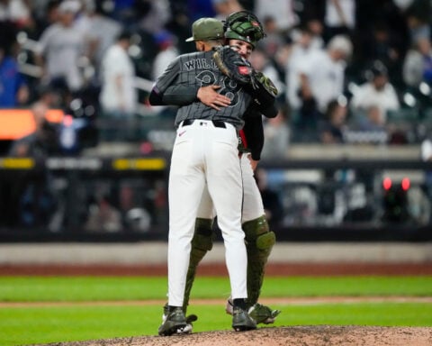 Weaver's fib: Tells injured Holmes he had name written in cap because `it just felt right to say'