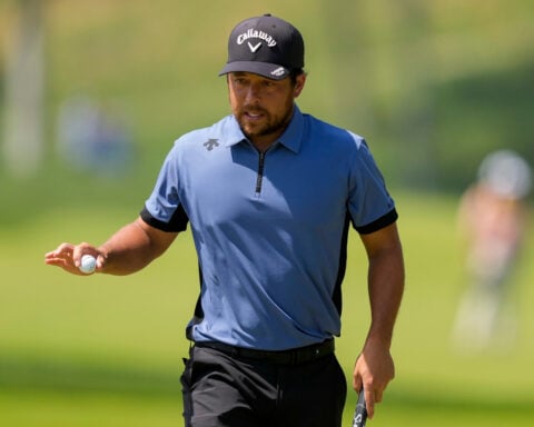 McIlroy has angry exchange with fan at PGA. Rahm, Smith, Schauffele also fade