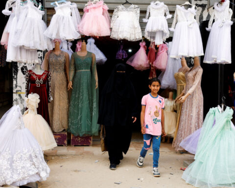 In war‑scarred Gaza, brides turn to refurbished wedding dresses