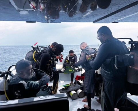 Italy's foreign minister says divers found bodies of 4 Italians in Maldives sea cave