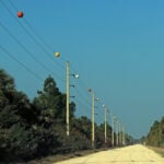 What are those orange balls on some power lines?