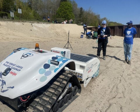 Robot sifter joins volunteers at Klode Park beach to pull plastic from Lake Michigan shoreline