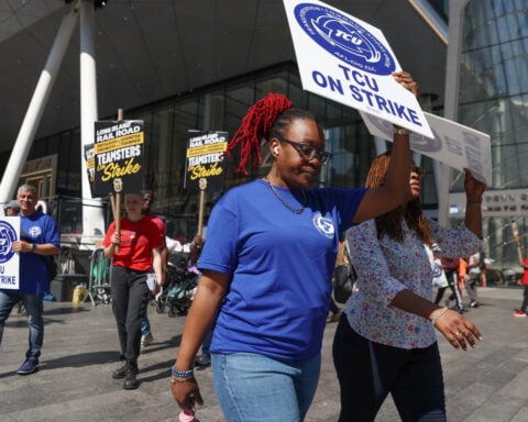 Riders navigate the first weekday of a strike that has shut down the largest US commuter rail system