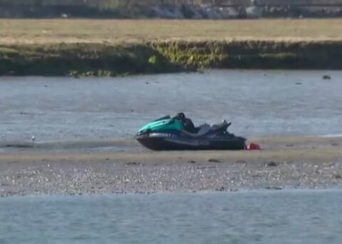Men rescued after struggling to swim to shore