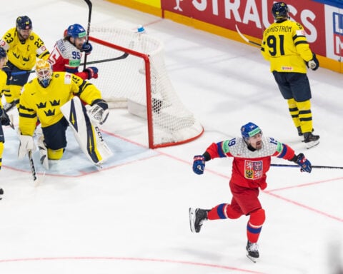 Canada beats Denmark and Crosby tallies 4 assists in third-period surge at hockey worlds