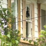 2 neighbors injured, homes and cars damaged during exchange of gunfire in KCK barricade situation