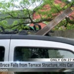 Driver survives terrifying close call with falling steel beam under ramp