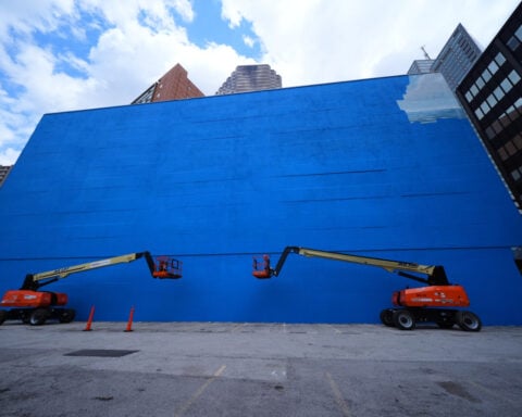 An outcry erupts as a whale mural beloved by many in Dallas is replaced with art for the World Cup