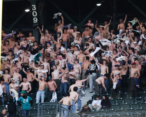 Shirtless fans the stars at MLB stadiums as 'Tarps Off' trend sweeps baseball world