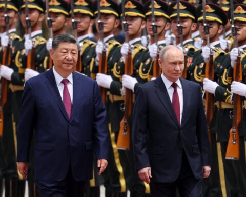 China’s Xi gives Putin a red-carpet welcome – and makes a veiled jab at the US