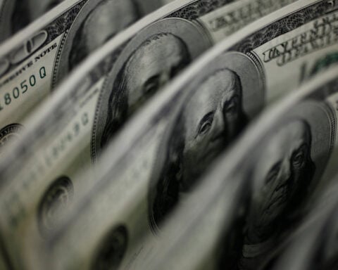 Dollar dips on hopes for Iran deal, yen near danger zone