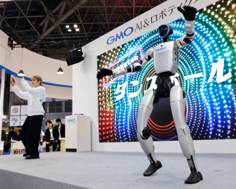 One in three Japan firms using or considering AI robots: Reuters poll