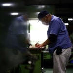 Japan's factory activity expands at slower pace, cost pressures surge