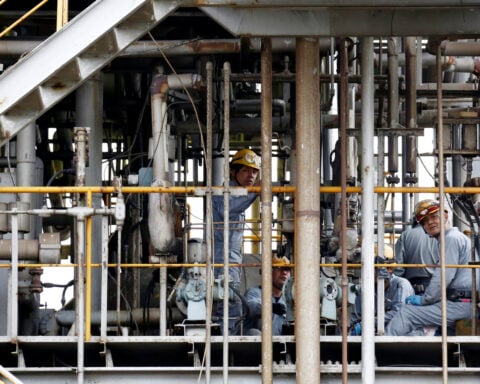 Japan's factory activity expands at slower pace, cost pressures surge