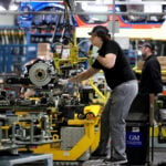 UK firms report slide in activity due to Iran war and political turmoil