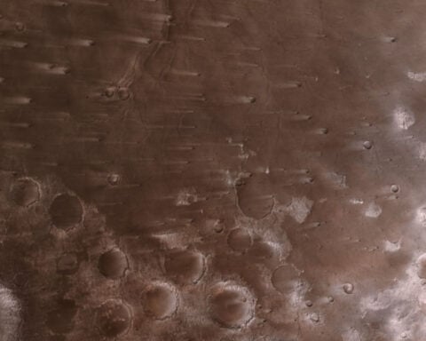 Asteroid mission captures rarely seen perspective of Mars during close flyby