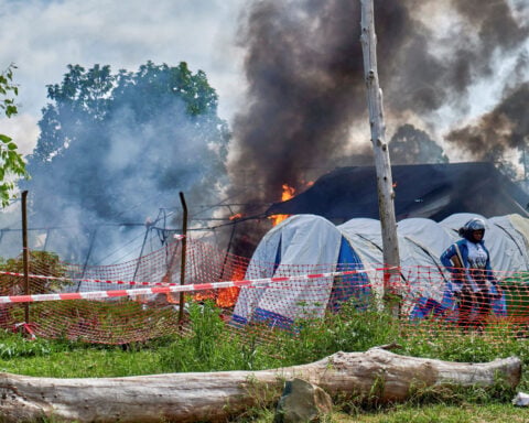 Protesters set Ebola treatment center on fire in DRC, demanding return of body